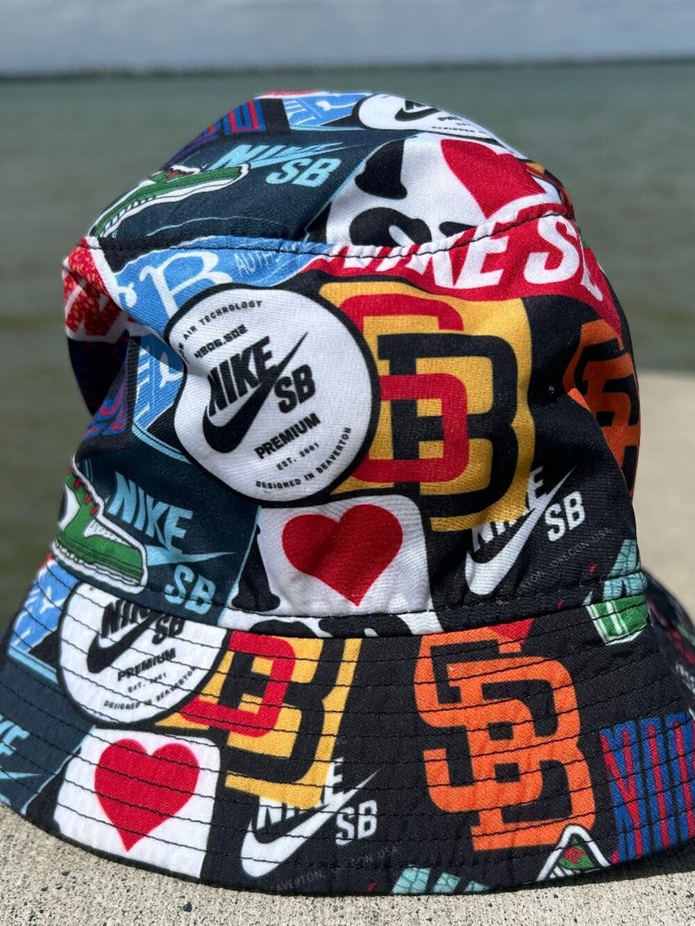Nike SB Premium Sticker Bomb Bucket Hat Size M AOP